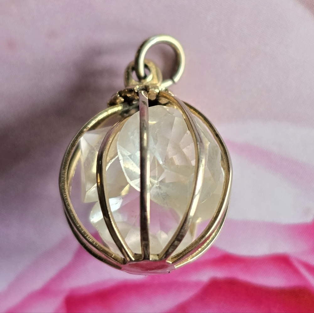 Vintage charm beads in a cage pendant charm gold tone